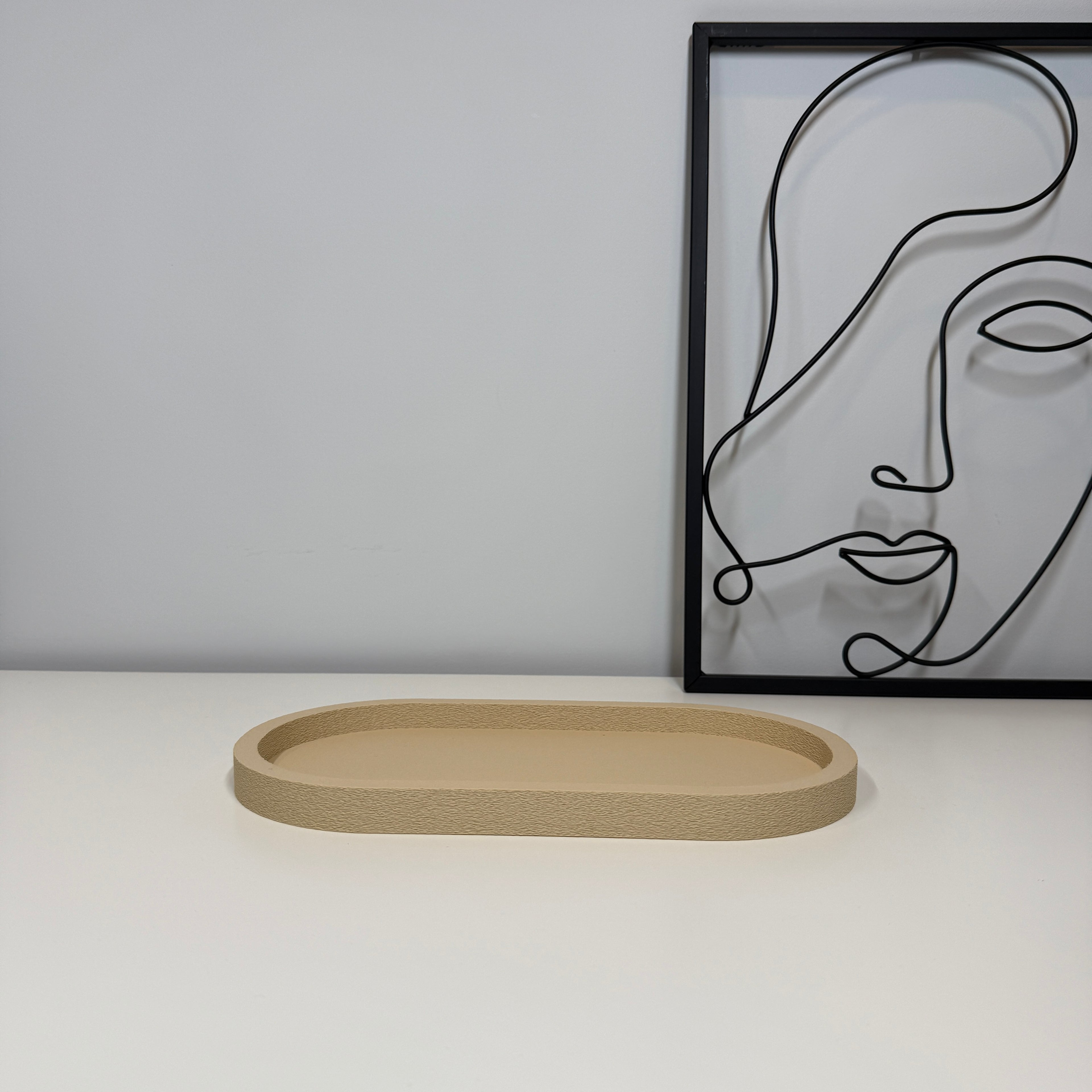 Minimalistinis ovalus padėkliukas namams