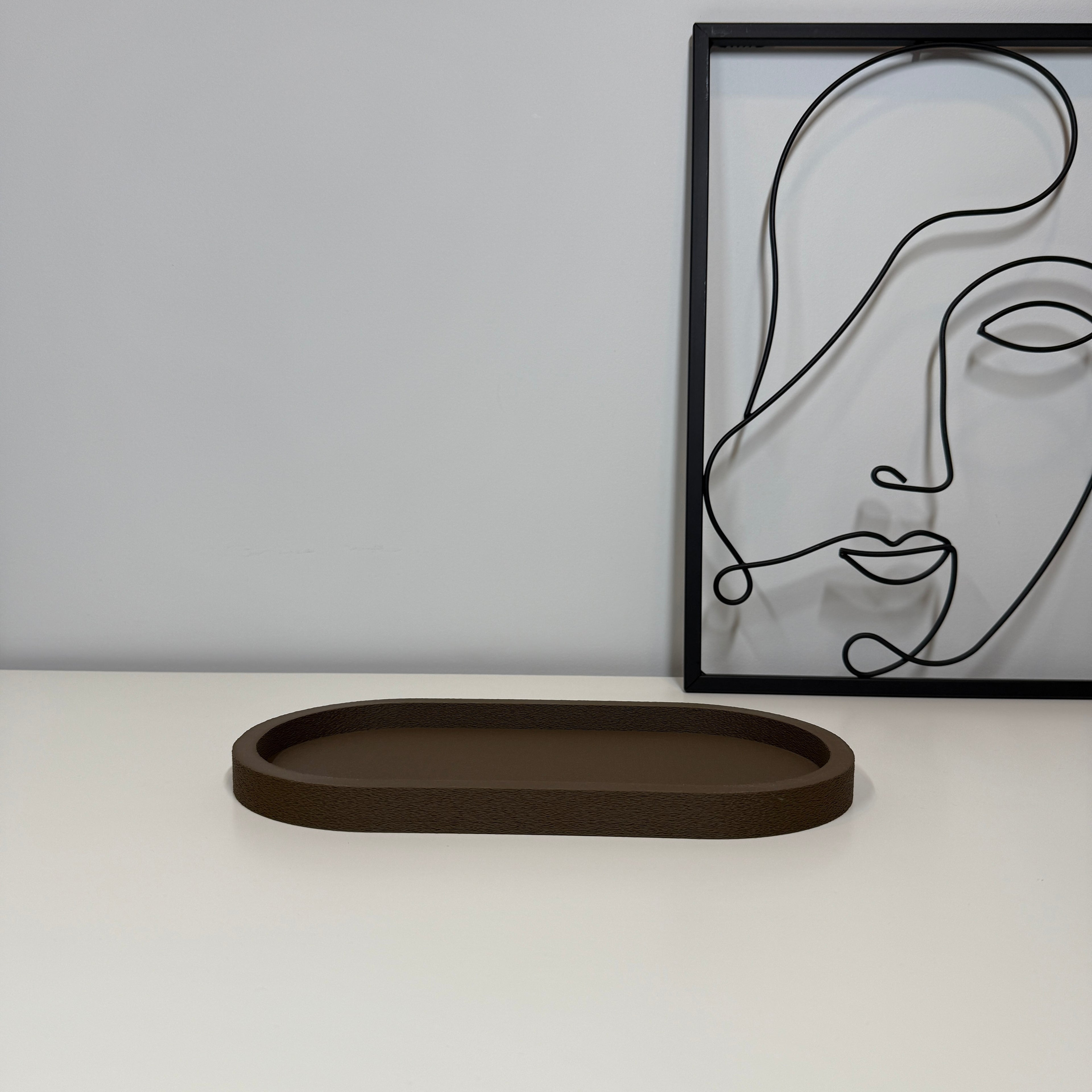 Minimalistinis ovalus padėkliukas namams